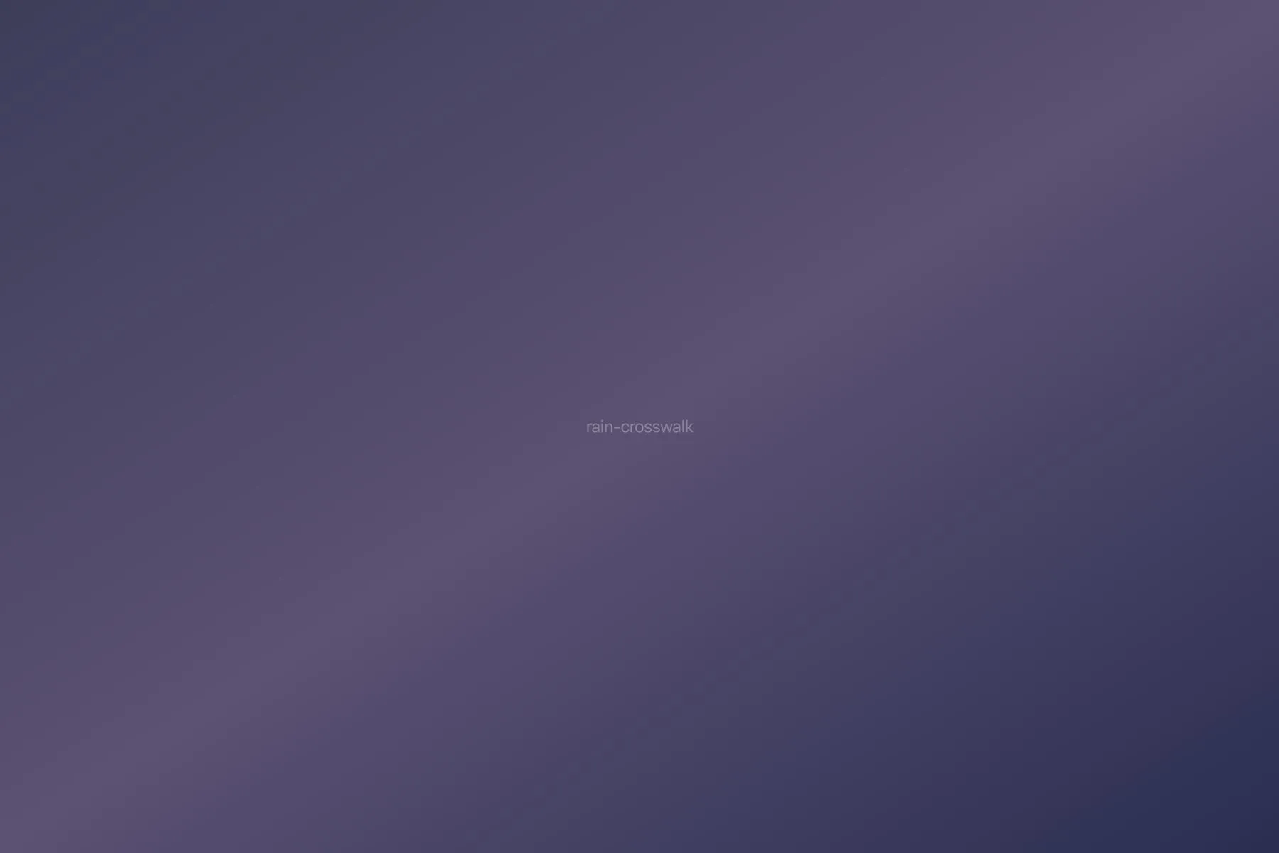 Empty crosswalk with rain streaks under streetlights